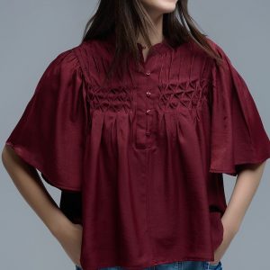 Camisa vino con pliegues frente