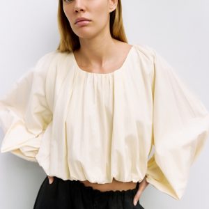 Top Jenna crema manga larga