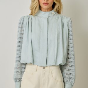 Sweater baby blue con hoyitos mangas delgado