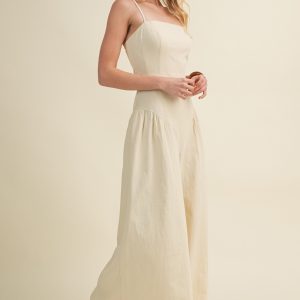 Jumpsuite beige con pligues piernas