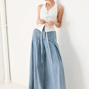 Jeans pinzas con bolsas frente